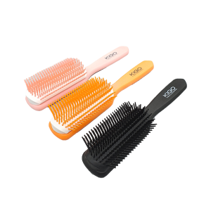 Kigo 9-Row Hair Styling Brush. Used to style hair. 3 Variations: Black, Pink, Orange.